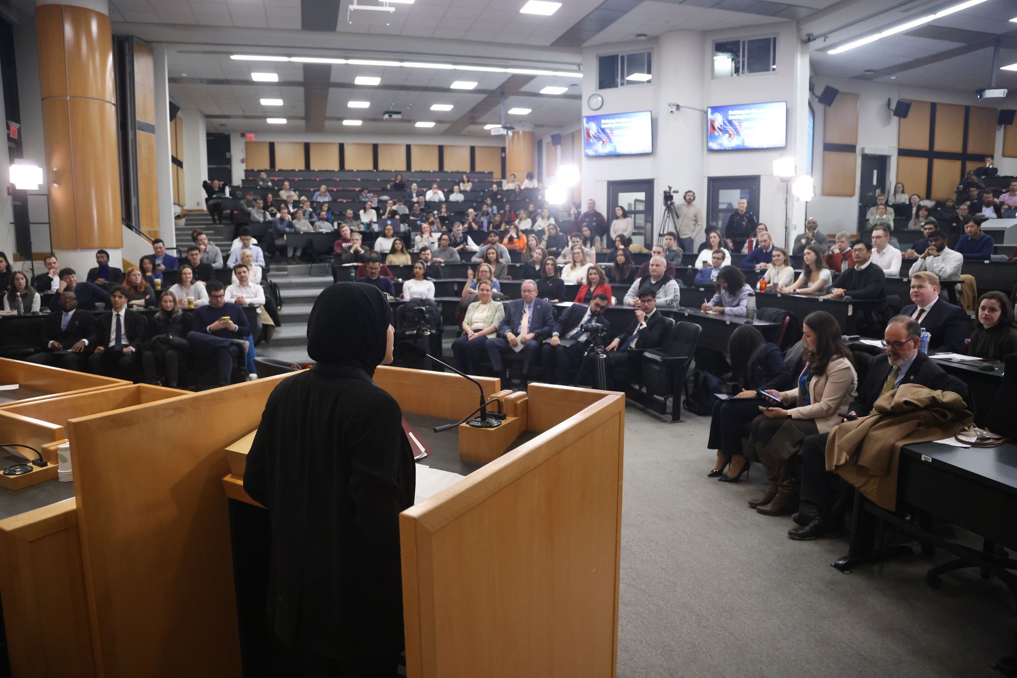 Full lecture hall during a national panel